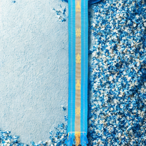 Selendang tenun khas Sumba Barat Daya (NTT) Motif Bunga dan Rumah Adat